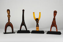 Four exceptional Baule, Ivory Coast, wooden slingshots