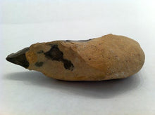 French hand axe, with cortex handle, and black stone