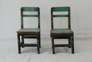 A pair of primitive Chinese children chairs